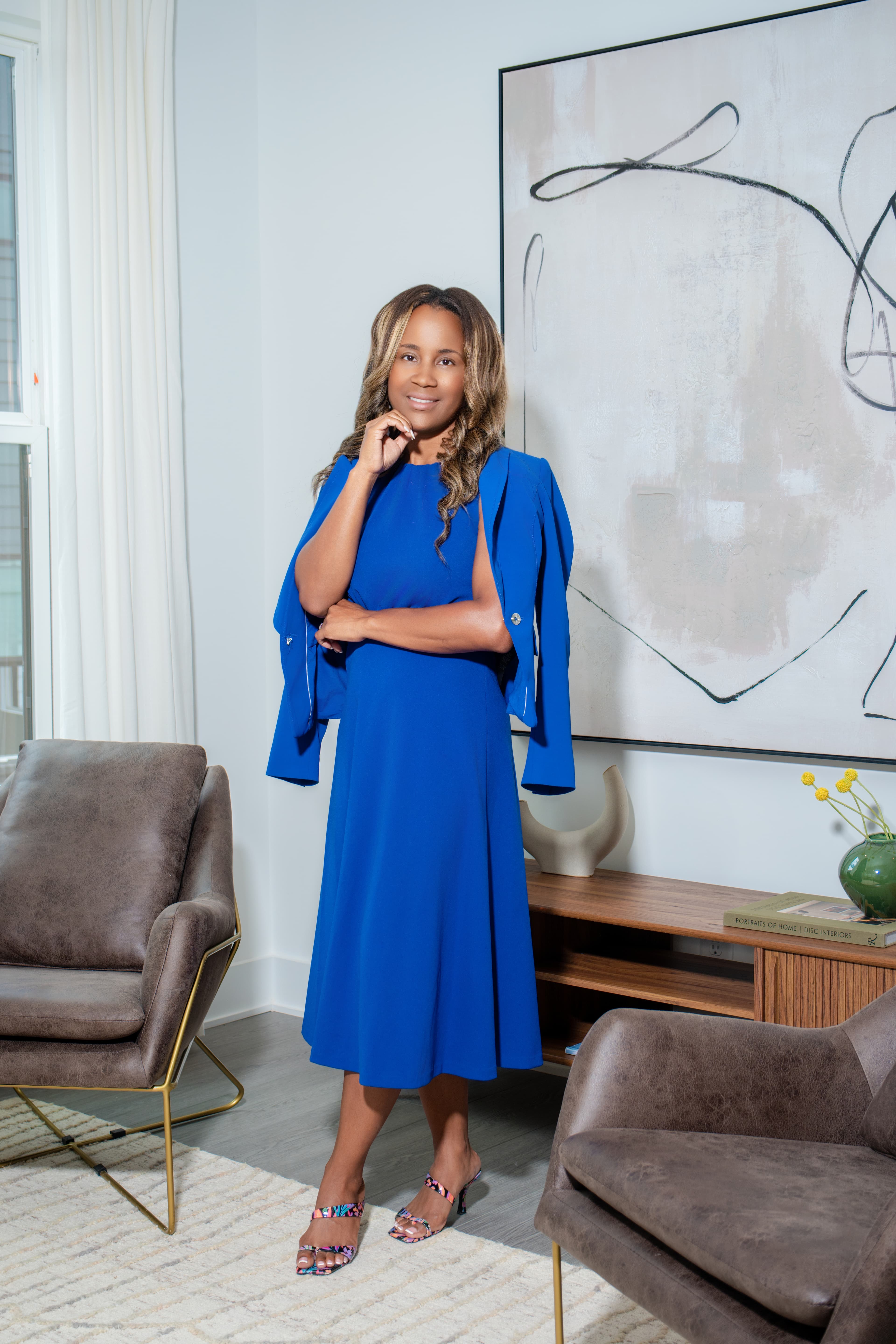 Advisor standing on elegant staircase